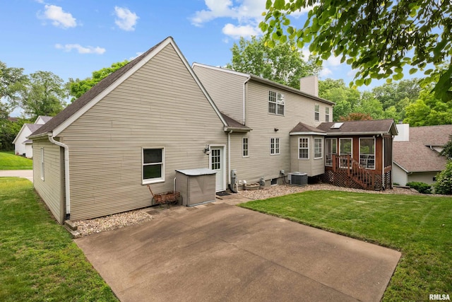 3513 33rd Street Ct, Moline, IL 61265 - rear view of property with a chimney, a patio, a yard, and cooling unit