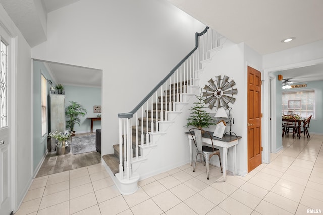 3513 33rd Street Ct, Moline, IL 61265 - foyer entrance with stairs, ceiling fan, light tile patterned flooring, baseboards, and recessed lighting