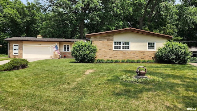 2606 4th Street Ct, East Moline, IL 61244 - ranch-style house with brick siding, a garage, a front yard, and a chimney