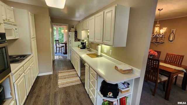2606 4th Street Ct, East Moline, IL 61244 - kitchen featuring a sink, stainless steel appliances, dark wood-style floors, open shelves, and light countertops