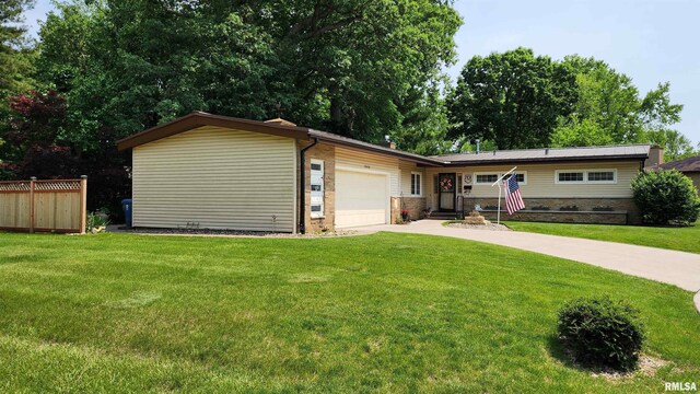 2606 4th Street Ct, East Moline, IL 61244 - ranch-style house with an attached garage, driveway, and brick siding