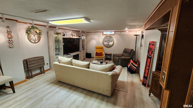 2606 4th Street Ct, East Moline, IL 61244 - living area featuring light wood finished floors and baseboards