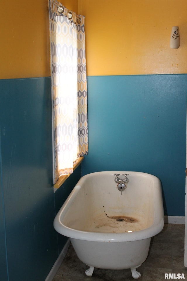 205 W Court St, Cambridge, IL 61238 - full bath featuring a freestanding tub, baseboards, and healthy amount of natural light