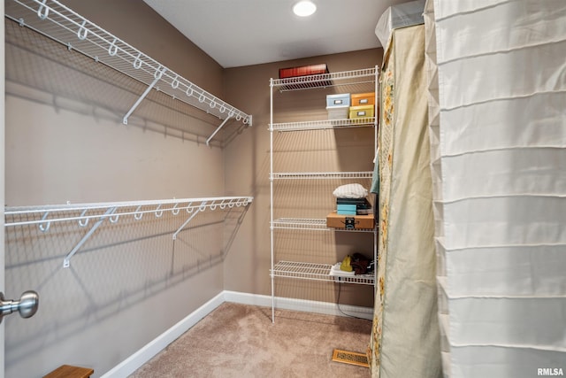 7318 35th Avenue Ct, Moline, IL 61265 - spacious closet featuring carpet flooring