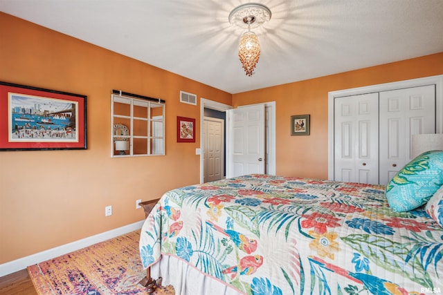7318 35th Avenue Ct, Moline, IL 61265 - bedroom featuring a closet and baseboards