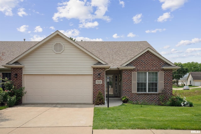 7318 35th Avenue Ct, Moline, IL 61265 - view of front facade with brick siding, a shingled roof, an attached garage, and driveway