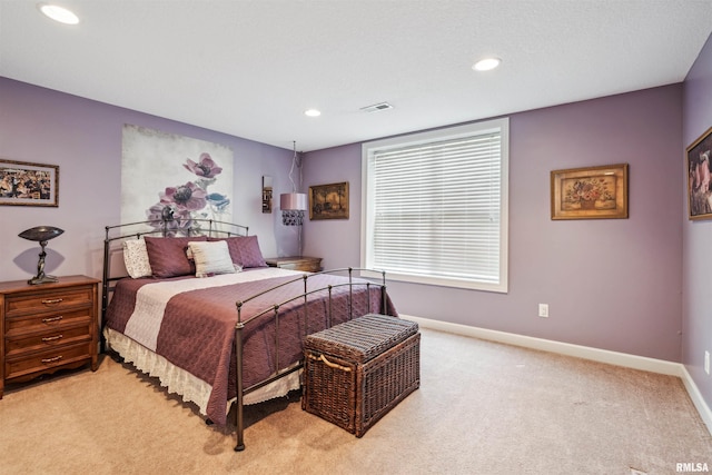 7318 35th Avenue Ct, Moline, IL 61265 - bedroom featuring light carpet, baseboards, and recessed lighting