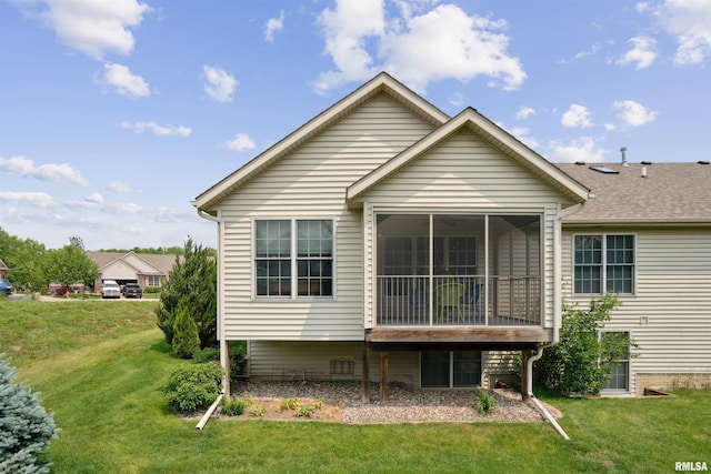 7318 35th Avenue Ct, Moline, IL 61265 - rear view of house with a yard and a sunroom