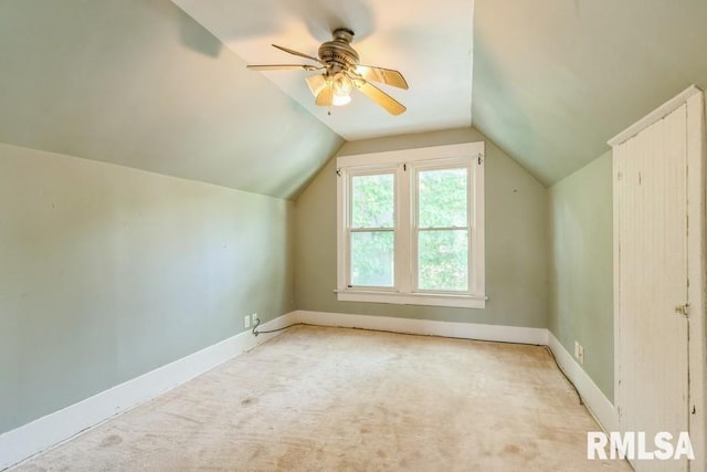 2308 18th Ave, Moline, IL 61265 - additional living space with vaulted ceiling, carpet, baseboards, and a ceiling fan
