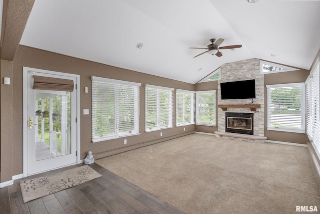 1872 19th Ave, Moline, IL 61265 - unfurnished living room with vaulted ceiling, ceiling fan, wood finished floors, and a fireplace