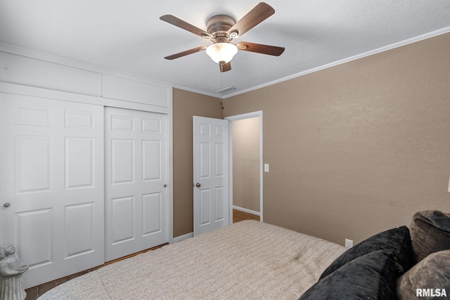 1872 19th Ave, Moline, IL 61265 - bedroom featuring a closet, crown molding, and ceiling fan