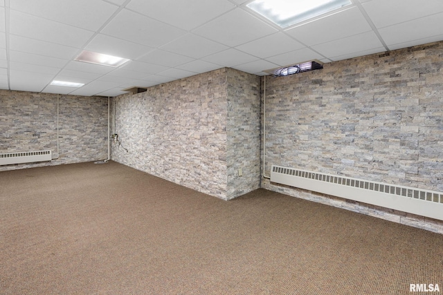 1872 19th Ave, Moline, IL 61265 - unfurnished room featuring a paneled ceiling, carpet flooring, baseboard heating, and radiator
