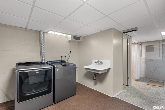 1872 19th Ave, Moline, IL 61265 - laundry area featuring washing machine and dryer, concrete block wall, and carpet