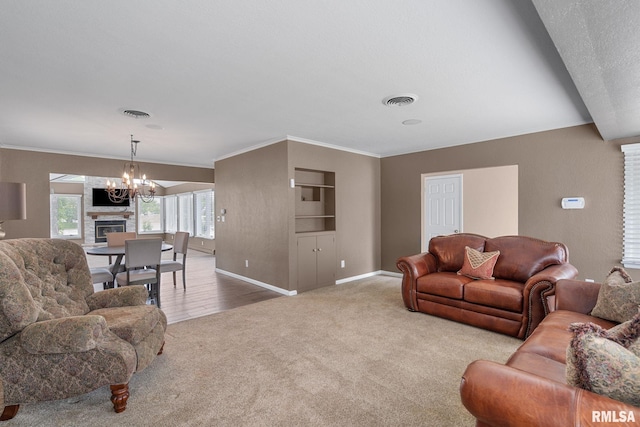 1872 19th Ave, Moline, IL 61265 - living room featuring carpet floors, a chandelier, and crown molding