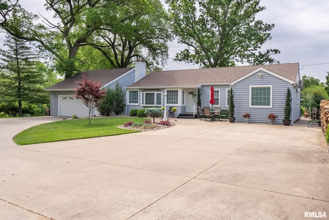 1872 19th Ave, Moline, IL 61265 - ranch-style home featuring concrete driveway, a shingled roof, a front yard, a chimney, and entry steps