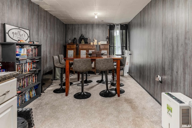 1013 Kirkpatrick St, Benton, IL 62812 - dining space featuring light carpet and wood walls