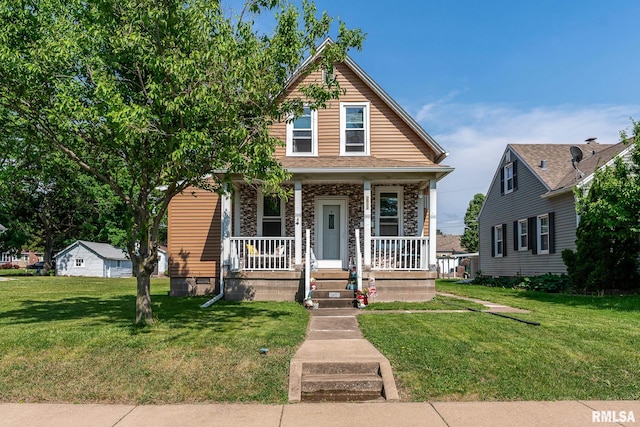 2612 7th St, Moline, IL 61265 - view of front of house with covered porch, a front yard, and stone siding