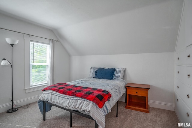 2612 7th St, Moline, IL 61265 - bedroom with lofted ceiling, carpet flooring, and baseboards
