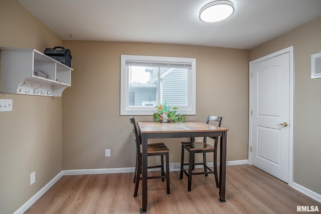 2612 7th St, Moline, IL 61265 - dining area with light wood-style flooring and baseboards