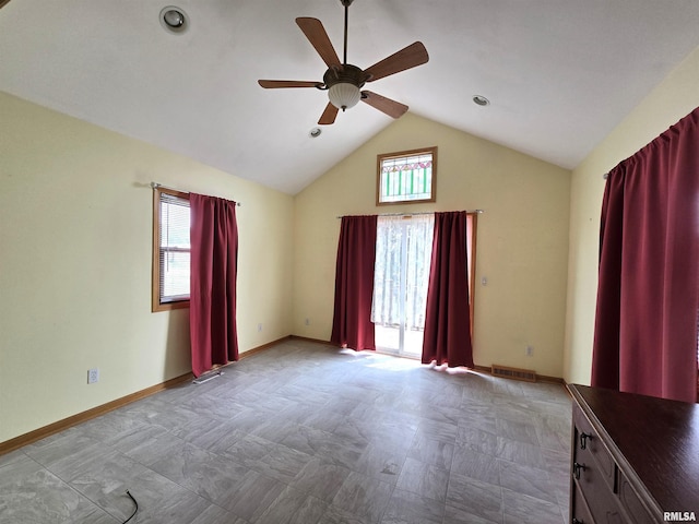 1907 S 15th Ave, Clinton, IA 52732 - spare room with ceiling fan, baseboards, and vaulted ceiling