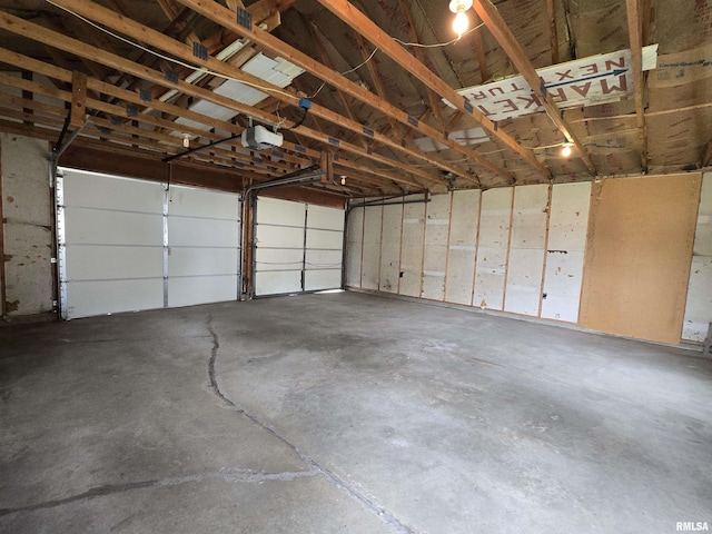 1907 S 15th Ave, Clinton, IA 52732 - garage featuring a garage door opener