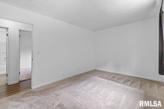3069 4th St Unit 4, Moline, IL 61265 - carpeted empty room with baseboards
