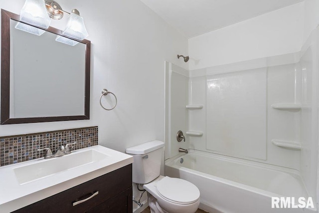 3069 4th St Unit 4, Moline, IL 61265 - full bathroom featuring backsplash, vanity, and bathtub / shower combination