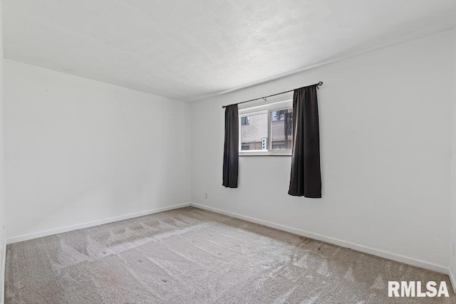 3069 4th St Unit 4, Moline, IL 61265 - carpeted empty room with baseboards