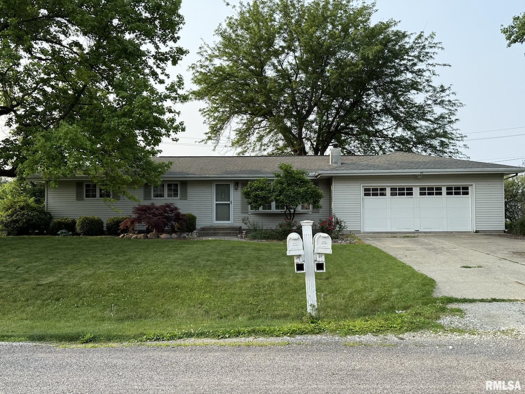26 Twilight Ln, Springfield, IL 62712 - ranch-style home with an attached garage, concrete driveway, and a front yard