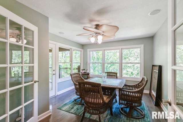 461 45th Ave, East Moline, IL 61244 - dining space with baseboards, wood finished floors, ceiling fan, and french doors