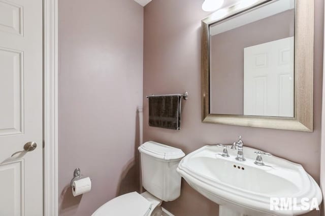 461 45th Ave, East Moline, IL 61244 - bathroom with toilet and a sink