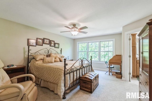 461 45th Ave, East Moline, IL 61244 - bedroom with light carpet, baseboards, and ceiling fan