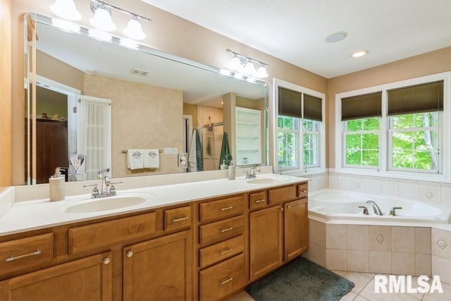 461 45th Ave, East Moline, IL 61244 - bathroom with a bath, double vanity, tile patterned floors, and a shower