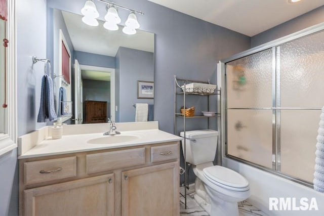 461 45th Ave, East Moline, IL 61244 - full bath featuring vanity, toilet, and enclosed tub / shower combo