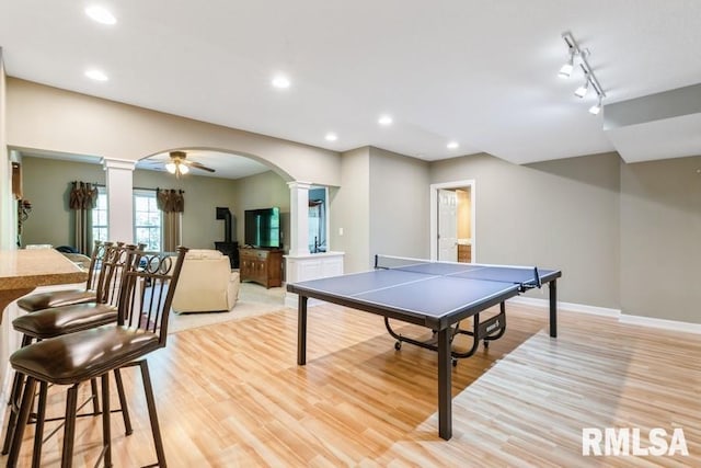 461 45th Ave, East Moline, IL 61244 - game room featuring ornate columns, arched walkways, light wood-type flooring, baseboards, and recessed lighting