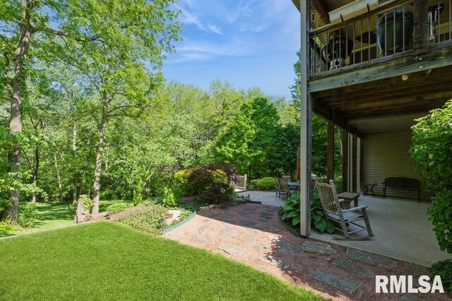 461 45th Ave, East Moline, IL 61244 - view of green lawn featuring a patio area
