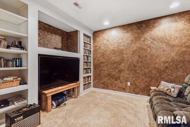 461 45th Ave, East Moline, IL 61244 - living area with carpet flooring, built in shelves, recessed lighting, ornamental molding, and baseboards
