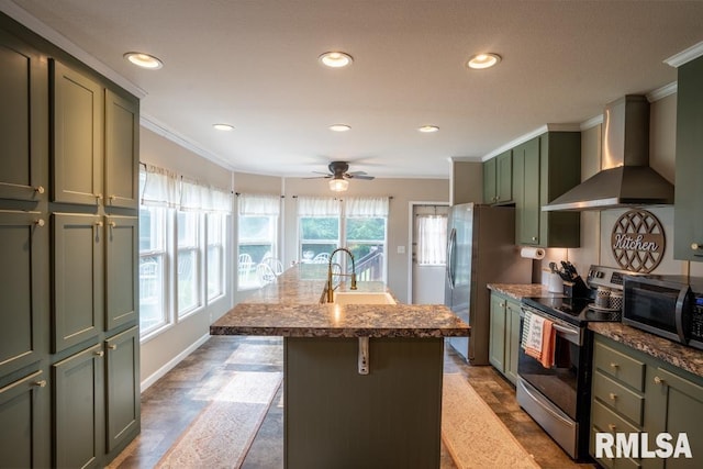 11271 W Center Rd, Mulkeytown, IL 62865 - kitchen with stainless steel appliances, wall chimney exhaust hood, green cabinetry, crown molding, and baseboards