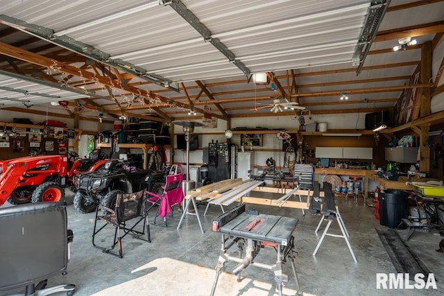 11271 W Center Rd, Mulkeytown, IL 62865 - garage with a workshop area and a garage door opener