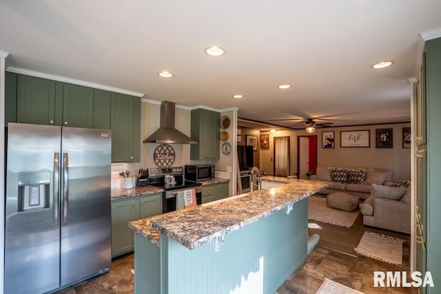 11271 W Center Rd, Mulkeytown, IL 62865 - kitchen with appliances with stainless steel finishes, wall chimney range hood, green cabinetry, a ceiling fan, and open floor plan