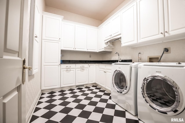 2 Hickory Ct, Rock Island, IL 61201 - washroom featuring dark floors, cabinet space, and washing machine and dryer