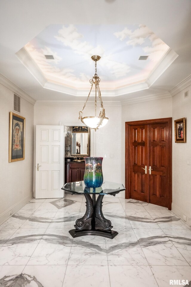 2 Hickory Ct, Rock Island, IL 61201 - hall with a raised ceiling, light marble finish floors, ornamental molding, and baseboards