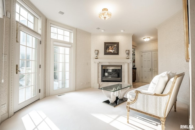 2 Hickory Ct, Rock Island, IL 61201 - sitting room with a fireplace, ornamental molding, and carpet flooring