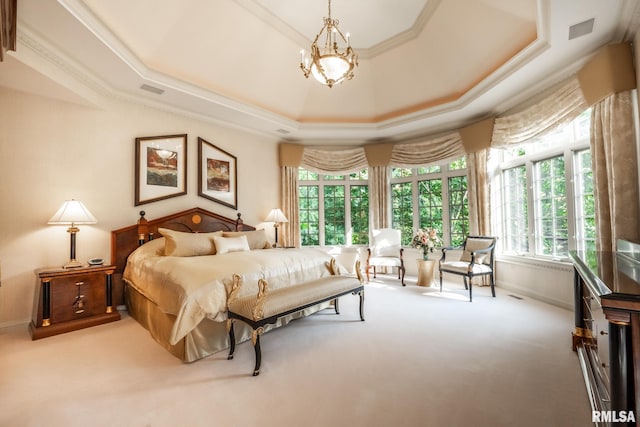 2 Hickory Ct, Rock Island, IL 61201 - carpeted bedroom with a raised ceiling, a chandelier, crown molding, and baseboards