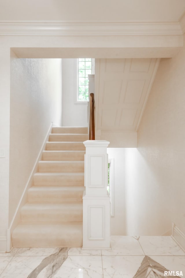 2 Hickory Ct, Rock Island, IL 61201 - stairs with marble look tiles and crown molding
