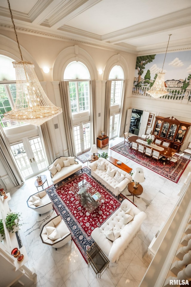 2 Hickory Ct, Rock Island, IL 61201 - living room with a high ceiling, a chandelier, ornamental molding, beam ceiling, and marble finish flooring