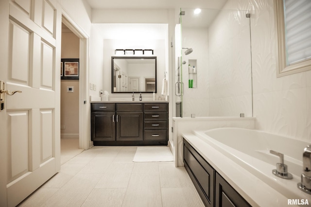 2 Hickory Ct, Rock Island, IL 61201 - bathroom featuring vanity, a bath, and a stall shower