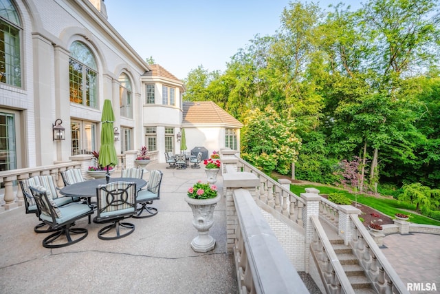 2 Hickory Ct, Rock Island, IL 61201 - view of patio with outdoor dining area and a grill