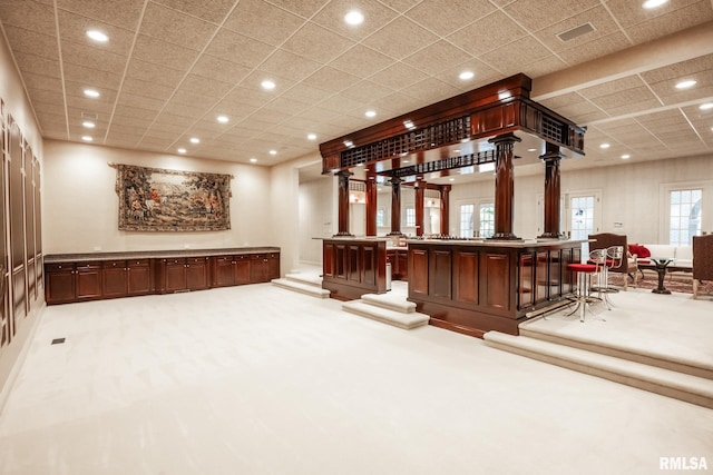 2 Hickory Ct, Rock Island, IL 61201 - bar area featuring decorative columns, recessed lighting, and light carpet