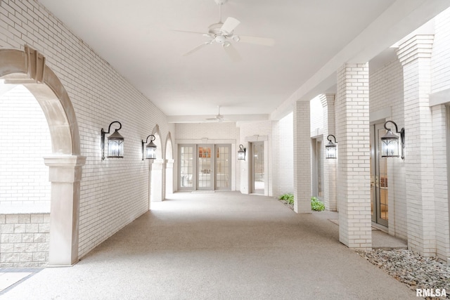 2 Hickory Ct, Rock Island, IL 61201 - hallway with brick wall and carpet